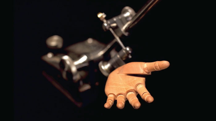 Articulated sculpted hand created by Elizabeth King for her artwork