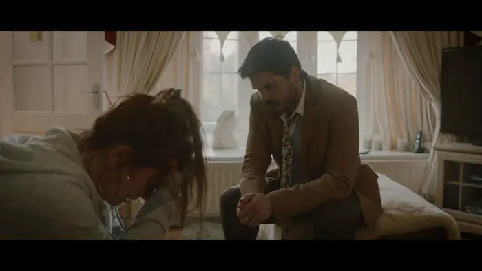 Tina breaks down while William watches in a tense moment from A Light Through Coloured Glass