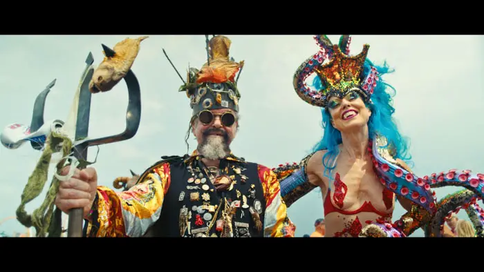 Joe Coleman and Whitney Ward dressed in elaborate sea-themed costumes at the Mermaid Parade in How Dark My Love