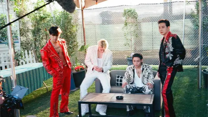 The Rose band members relax outdoors during filming of Come Back to Me documentary.