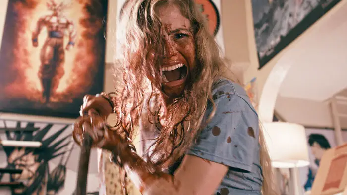 Blood-covered Claire screams mid-battle in ZombieCON Vol. 1
