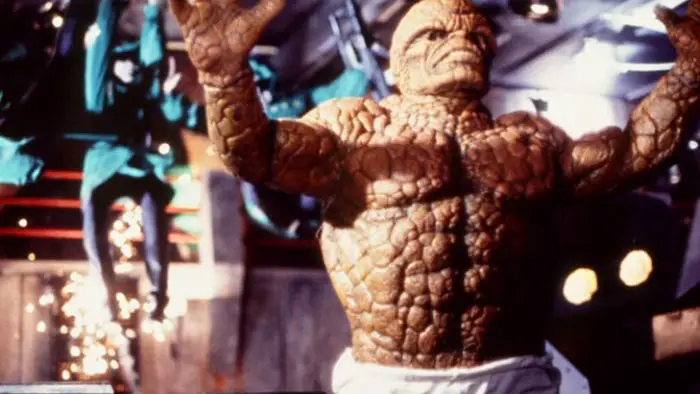 The Thing raises his arms during an action scene in Roger Corman’s The Fantastic Four