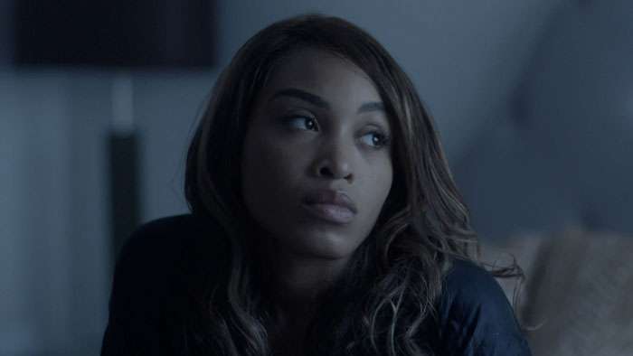 Kelsey Delemar as Brooklyn in Strangers looking off thoughtfully
