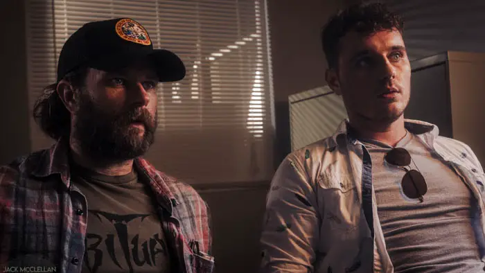 Anthony and Brooke sitting together in Against the Spread.