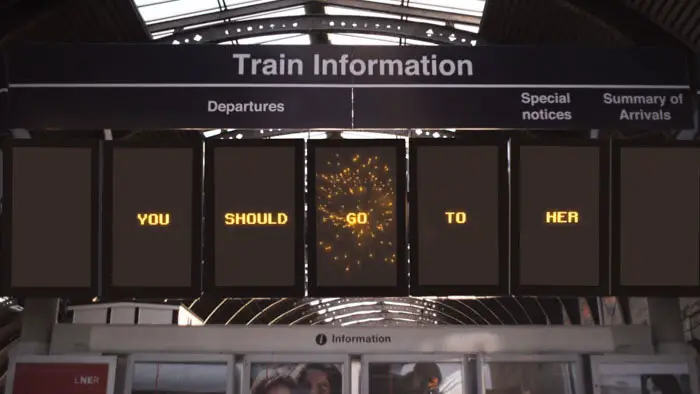 Train station sign displays a supernatural message in Between the Lights.