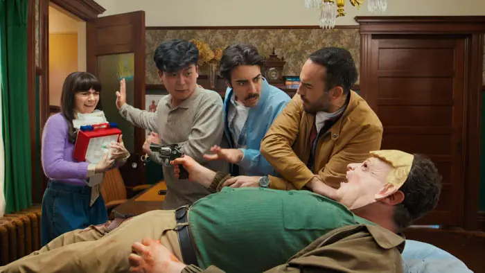 Scene from Doctor Doctor where Oliver and others struggle with an armed patient.