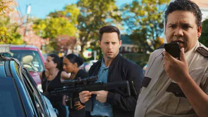 Police and armed responders outside the clinic in Doctor Doctor.