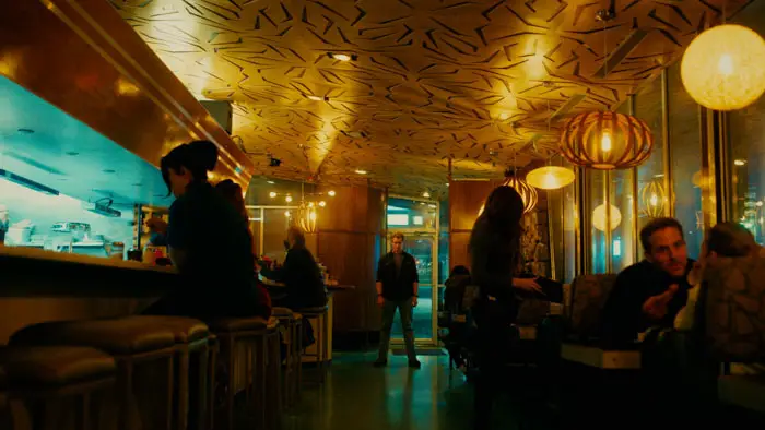 Brendan Fehr’s character stands at the entrance of a neon-lit diner in Kill Me Again