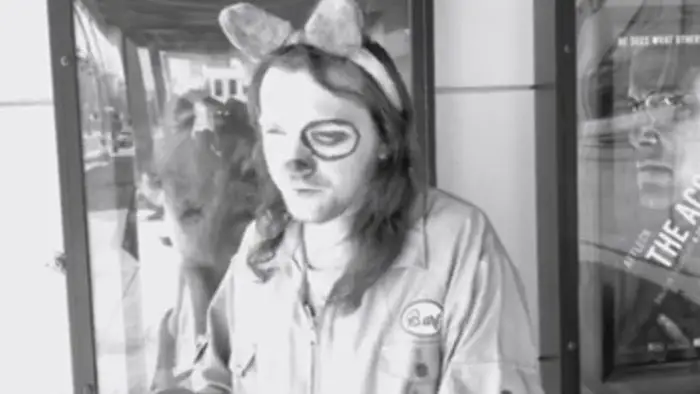 Actor dressed as “Son of Barf” in black-and-white scene from Movie Goers
