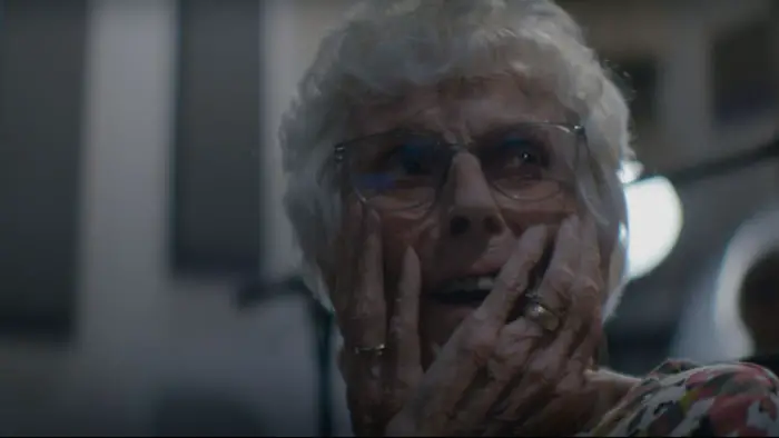 Elderly woman gasping in surprise during the making of Silver Screamers