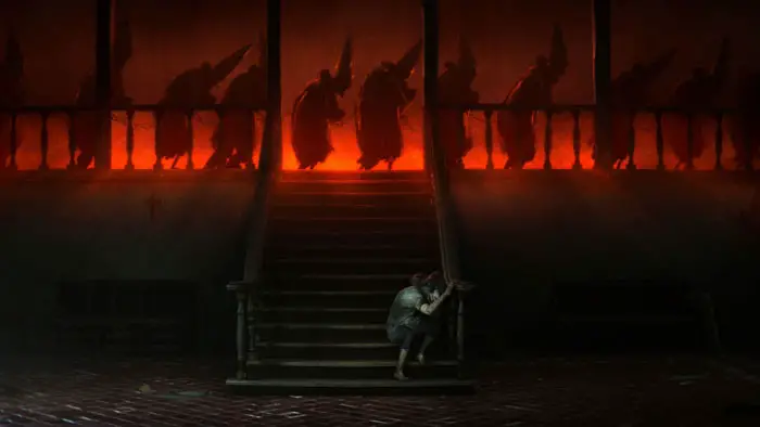 A terrified figure crouches at the bottom of a staircase as hooded ghostly figures loom above in The Quinta’s Ghost.