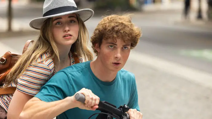 Dot Conner and Alex ride a scooter on their mission to solve the mystery.