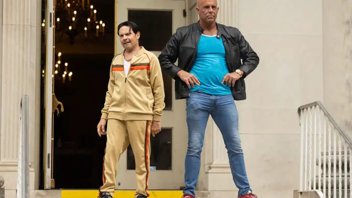 Viktor and Anton stand outside plotting their next move.