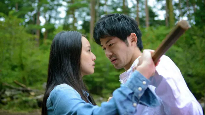Yuki Mamiya and Tasuku Nagaoka face off in the forest in Wet Woman in the Wind