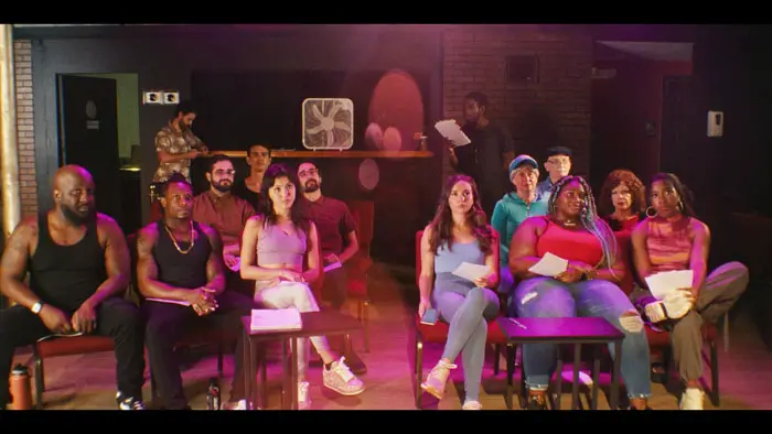 The ensemble cast of As You Like It – Like That! gathers for a lively rehearsal scene in Miami.