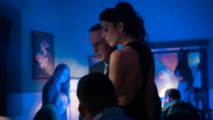 David Arquette and Daniella Pick Tarantino in a tense casino scene from The Perfect Gamble (2025).