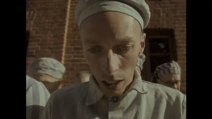 Emaciated prisoner in Auschwitz from Triumph of the Heart