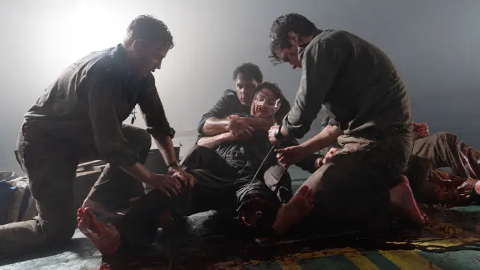 WWII soldiers fight to save a wounded comrade on a raft in Beast Of War (2025)