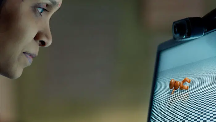 Nehma at her computer labeling images for AI in Humans in the Loop 