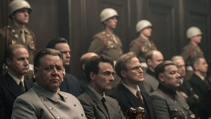 Russell Crowe as Hermann Göring sits in the courtroom during the Nuremberg trials.