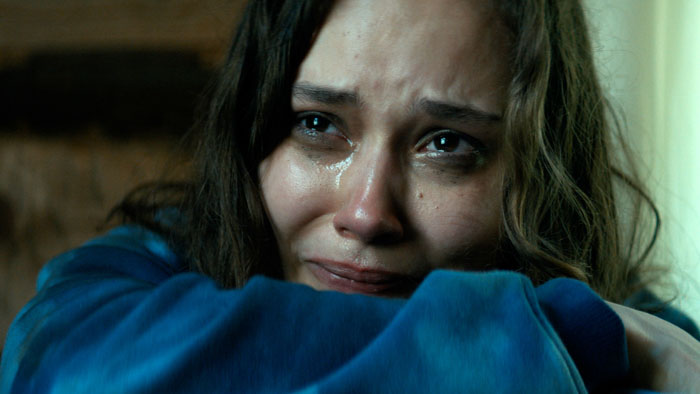Alyona Mitroshina crying in an emotional scene from The Healing