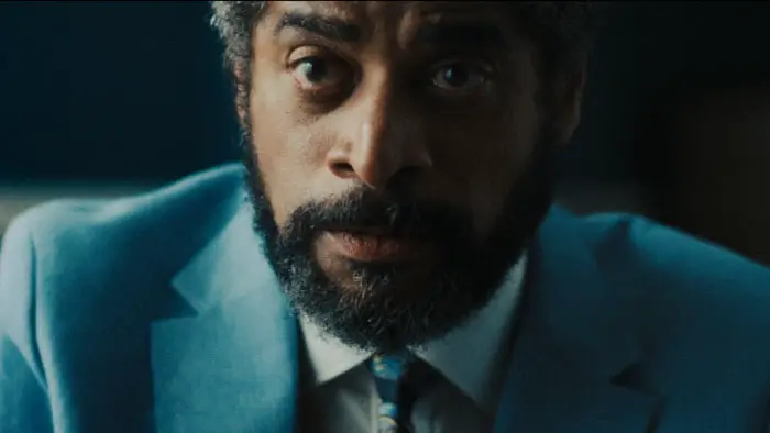 Fox (Karl Collins) in a close-up shot from The Last Dance, staring directly into the camera with an intense expression.