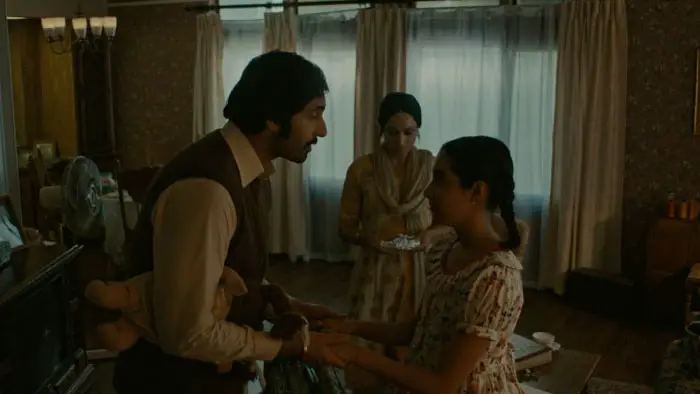 Jeet and Mandeep share a tense moment with their daughter before his flight in Flight 182