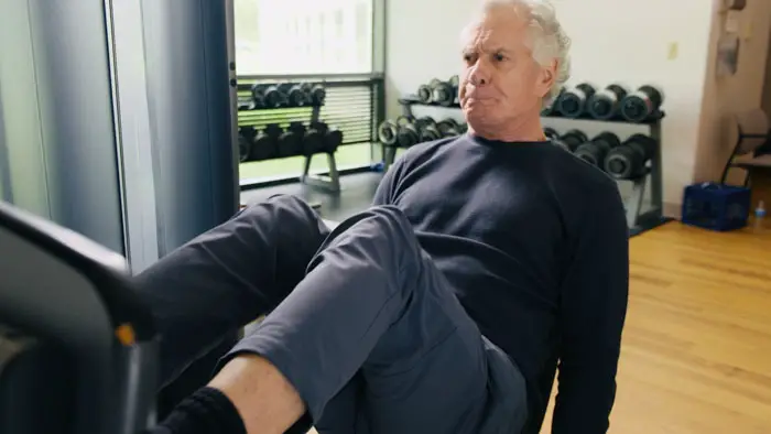 Dr. James Johnson demonstrates strength training as part of longevity research in Forever Young