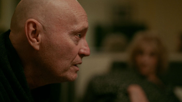 Jamie Jackson as Philippe Wokozi speaking intently during a pivotal recruitment scene in Jump Cuts (2025). 