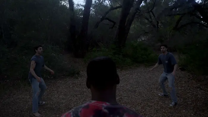 A terrified man screams as a clawed hand grips his shoulder in Quiet Anomalies Episode 1: The Delivery.