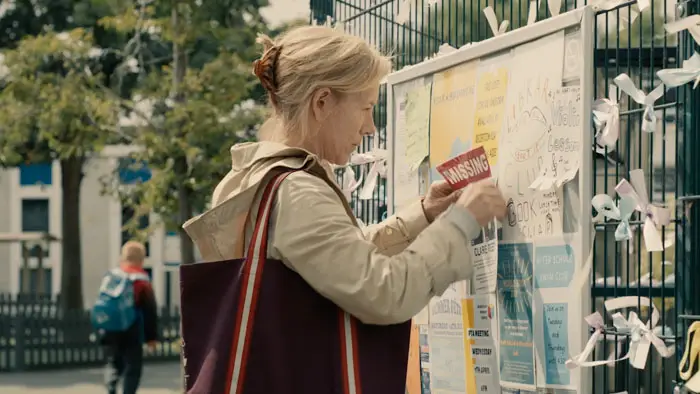 Juliet Stevenson posts a missing person flyer in Reawakening (2025)