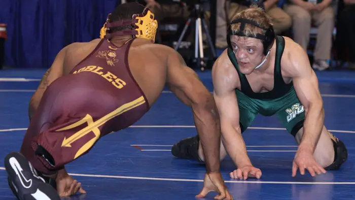 Ben Kjar competes in a wrestling match in Standout: The Ben Kjar Story