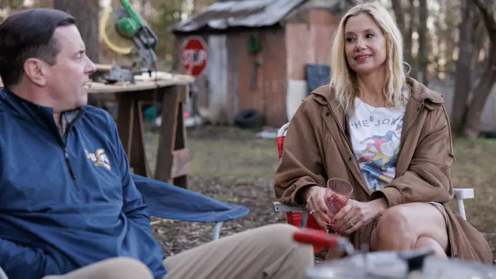 Michael Mosley and Mira Sorvino in a quiet outdoor conversation in Signing Tony Raymond.
