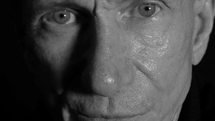 Close-up of the tormented narrator portrayed by Bill Oberst Jr. in The Imp of the Perverse.