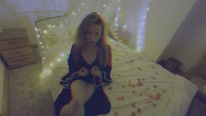 Amanda Sara Kay in a virtual intimacy sequence from the short film Crak Hack (2027).