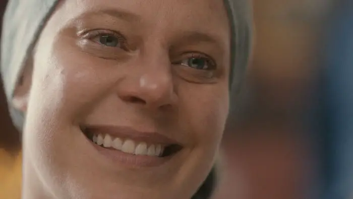 Alexandra Seal as Abby smiling in Lay Lefty Down